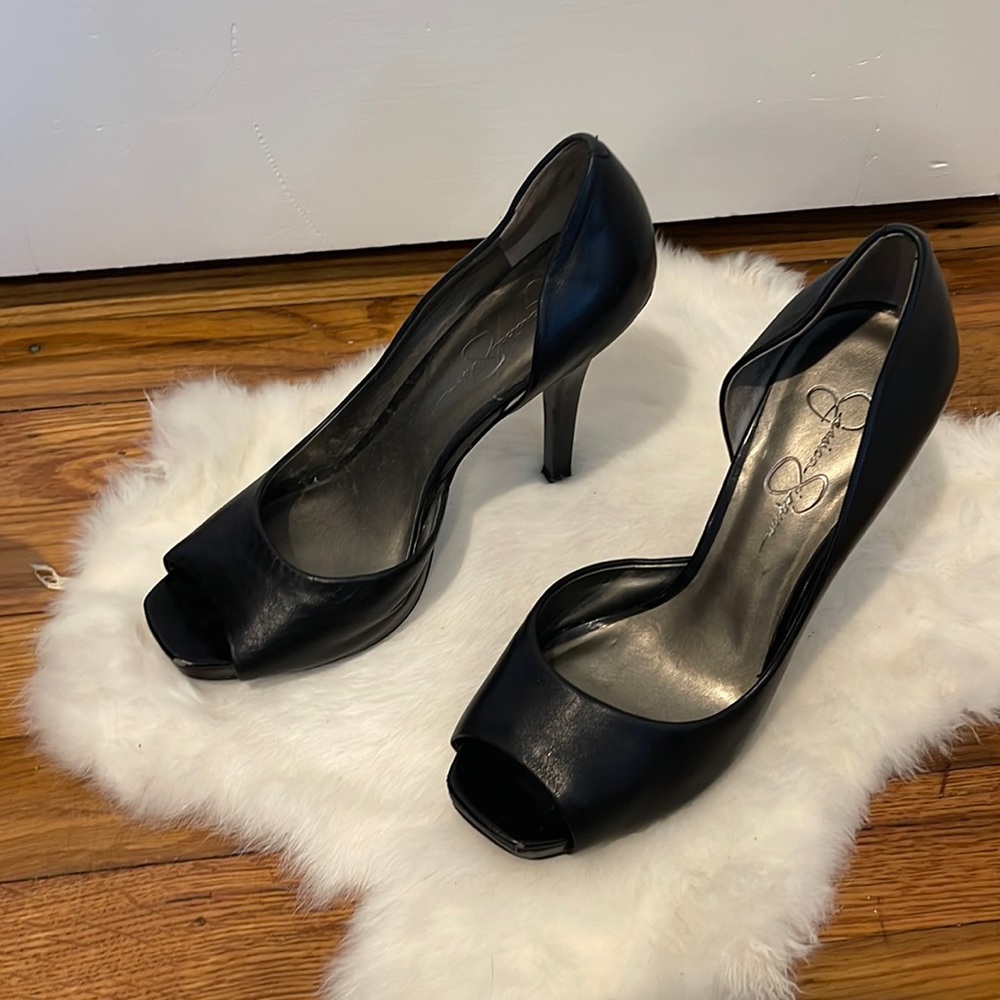 Jessica Simpson black open toed stilettos. Heel is 3.5 inches. Size 8.5.